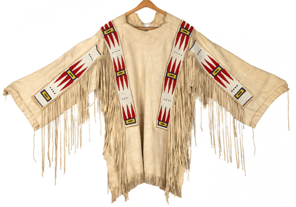 Buck skin with fringe and beaded decoration. Max L 40 1/2 in.